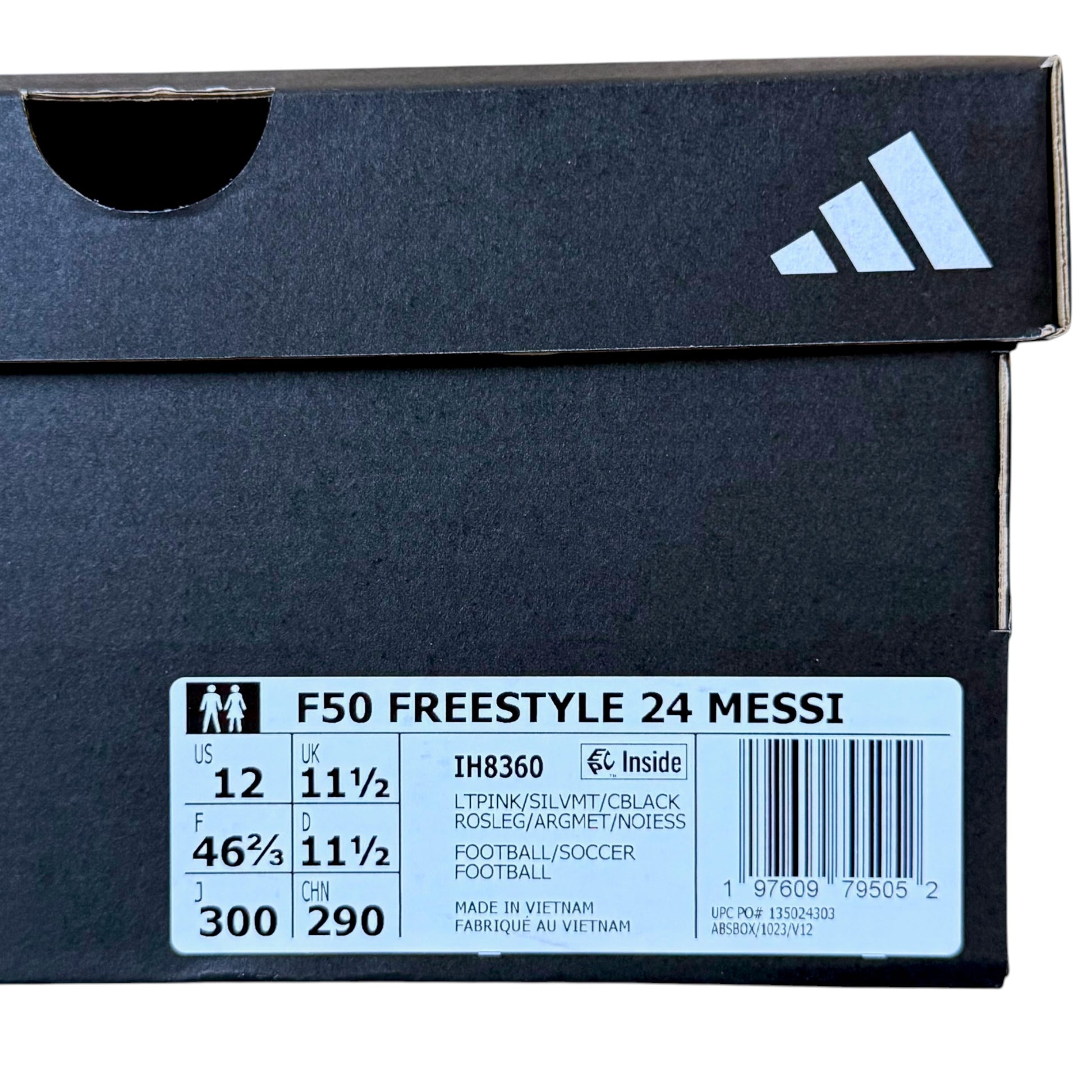 Close-up of an Adidas shoe box showing the size and model information for the F50 Freestyle 24 Messi edition, with a white size label on a dark charcoal box and the Adidas logo in the top right.