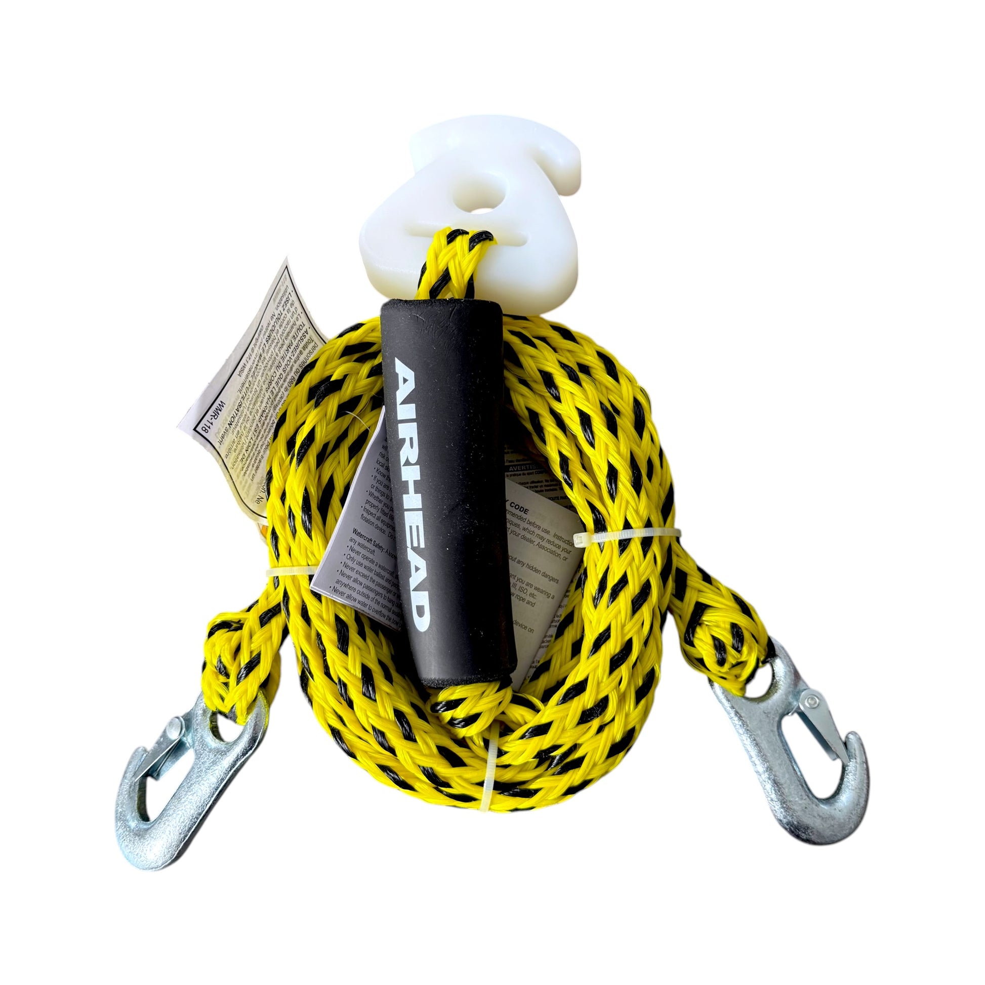 A coiled yellow and black tow harness, shown on a plain white background.