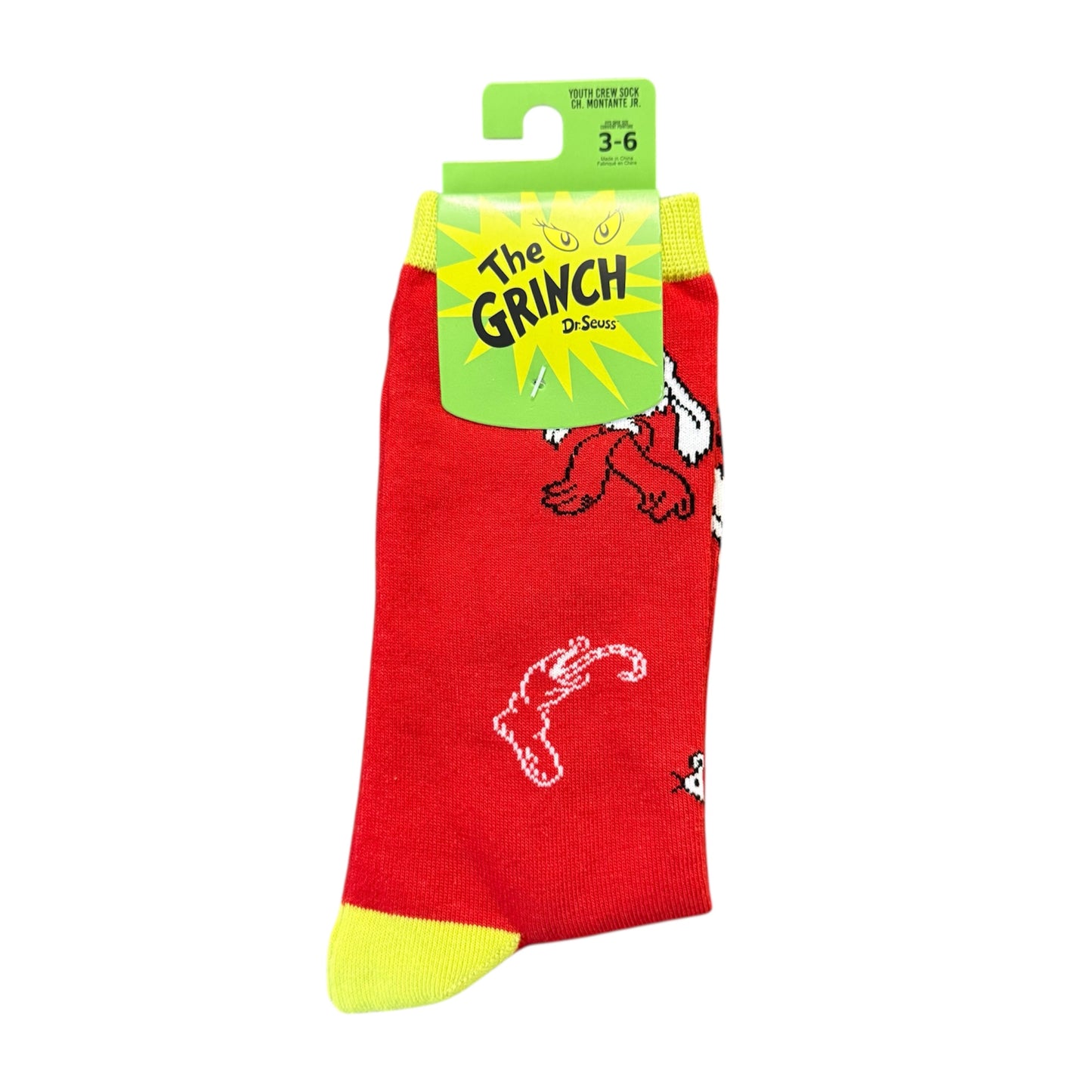 Red socks with a cartoon character design, featuring a green tag with 'The Grinch' text on a white background.