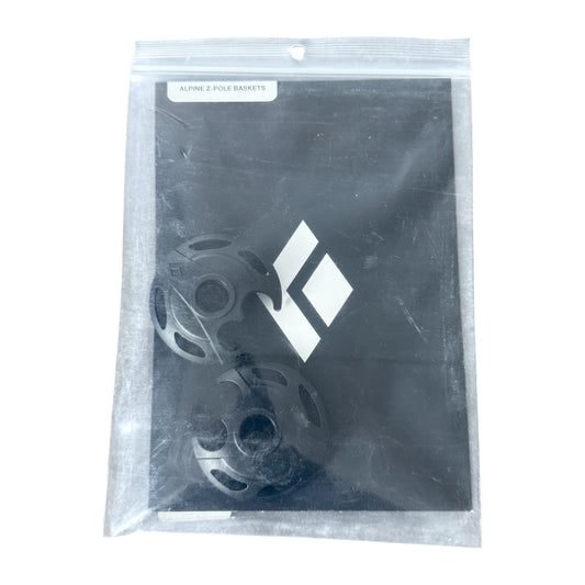 A pair of Black Diamond Alpine Pole Baskets in a clear plastic bag on a white background