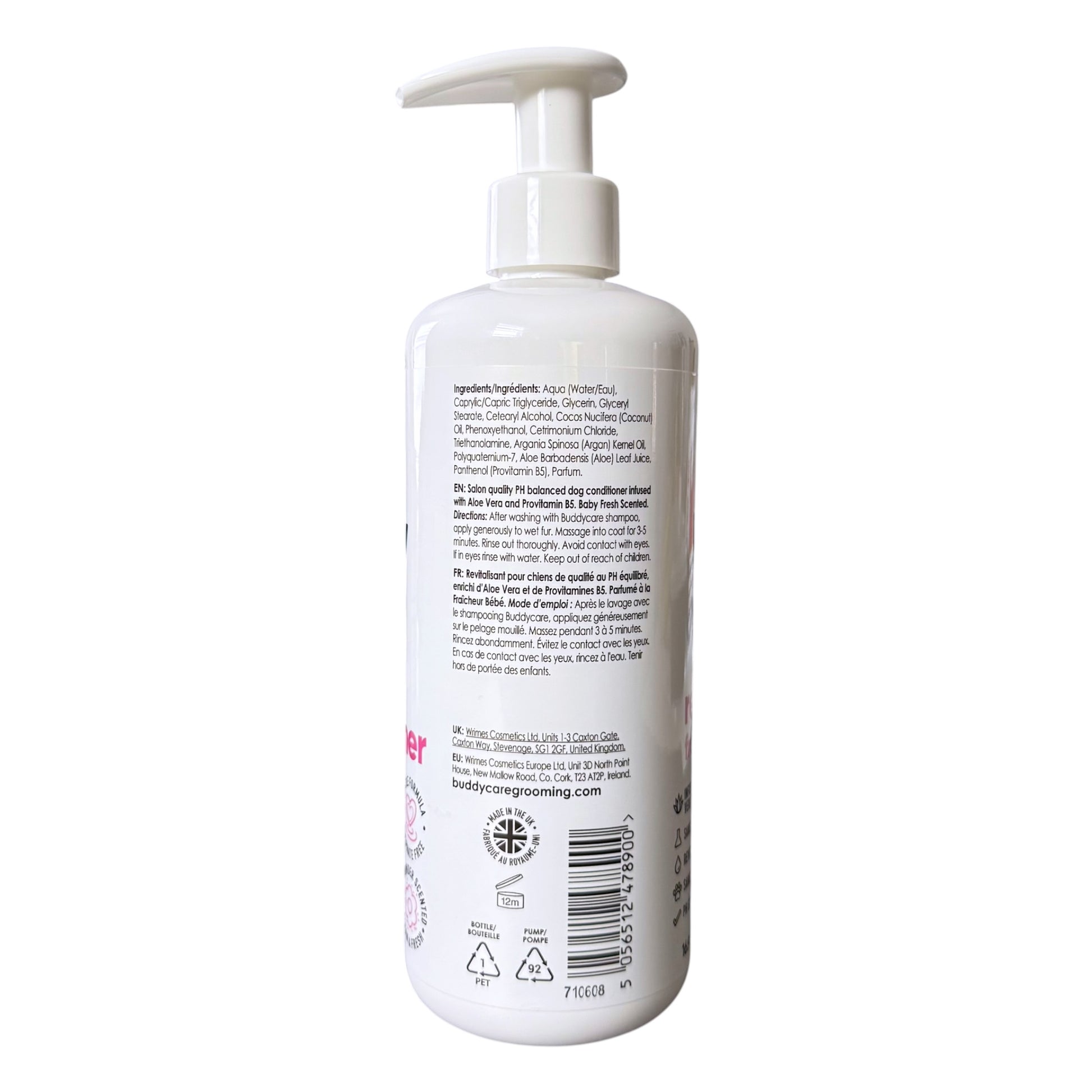 A white pump bottle of dog conditioner shown from the back, displaying the detailed product information, ingredients, barcode, and recycling symbols on a solid white background.