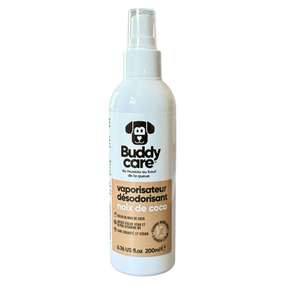 A white spray bottle of Buddy Care desodorizing spray for dogs, featuring a black dog logo and a beige label, on a plain white background.