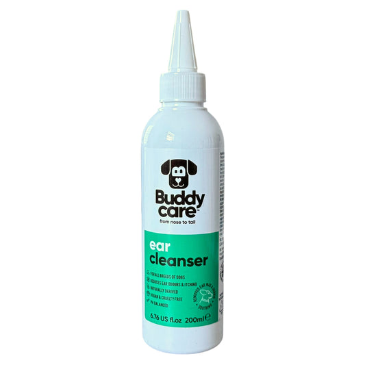 A white plastic bottle of Buddy Care Ear Cleanser with a pointed applicator cap, featuring a green label and black logo on a white background.