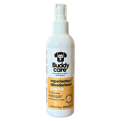 A white spray bottle of Buddy Care dog deodorizer with a clear cap, featuring a white and orange label with a black dog logo, on a plain white background.