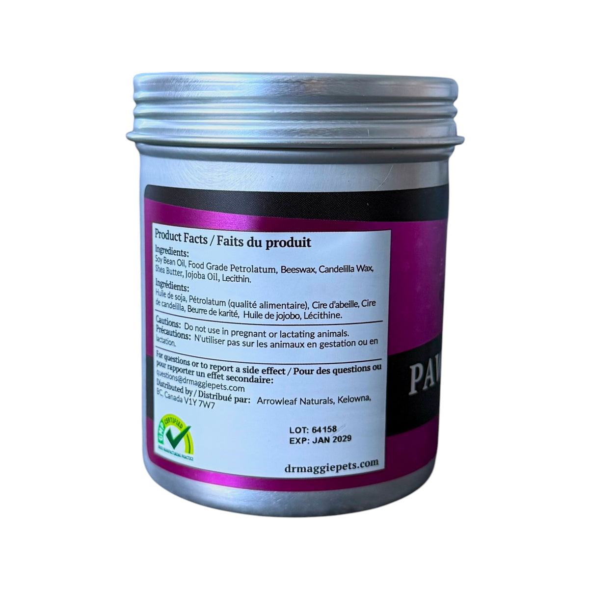 A silver metal canister of dog paw balm with a white and purple label, showing the product facts on a white background.