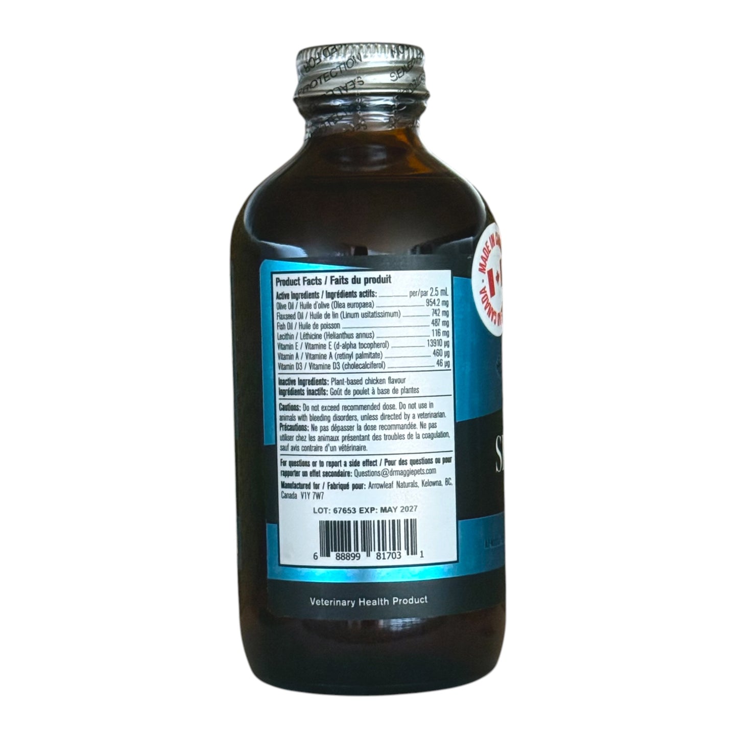 Side view of a dark amber bottle with a silver cap, showing a white nutrition facts label and a blue side label on a white background.