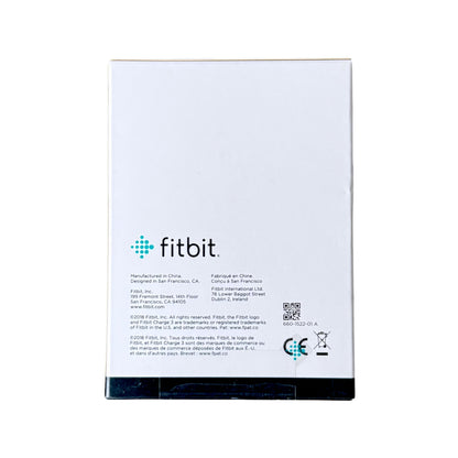 The back of a box showing the fitbit logo, manufacturing details, and a QR code on a white background.