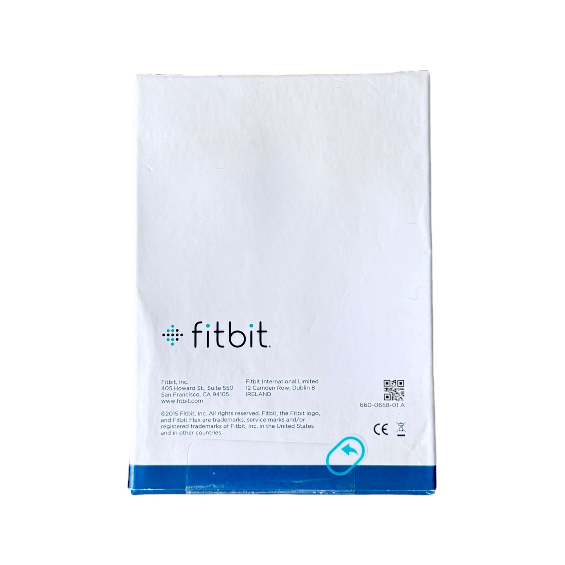 A Fitbit box with a 'fitbit' logo printed on the back, photographed on a plain white background.