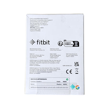 The back of a white Fitbit product box on a plain white background, showing compatibility text, manufacturer details, logos, and regulatory marks.