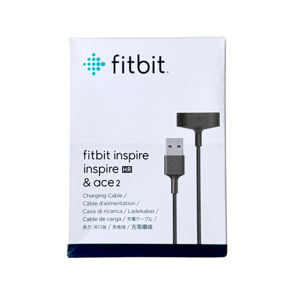 A white Fitbit charging cable box with a blue and green Fitbit logo, featuring a graphic of a black USB charging cable and text for Fitbit Inspire, Inspire HR, and Ace 2.