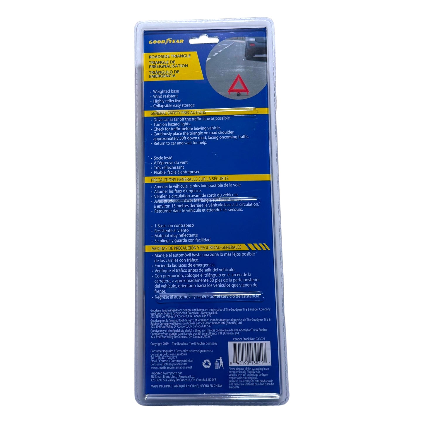 Goodyear Roadside Safety Triangle packaging, showing the blue and yellow back of the blister card with product details and a small photo of the reflector.