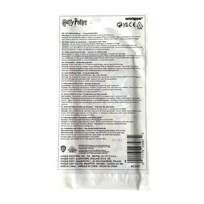 The back of a Harry Potter unique brand balloon, showing product information, warnings, barcodes, and a hang tab, photographed on a white background.