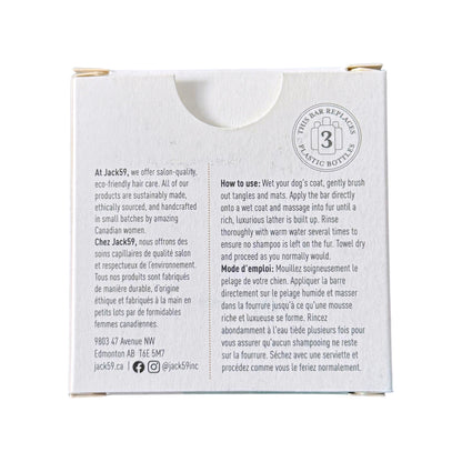 The back of a white cardboard box for Jack 59 pet hair care products, featuring bilingual English and French instructions, company details, and a circular logo.