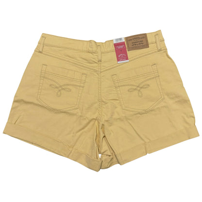 Photo shows a pair of yellow Levi Strauss Signature Women's Vintage A-Line Western Shorts with retail tags attached. Shown on a white background.