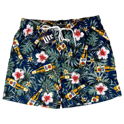 A pair of men's swim trunks featuring a dark navy blue tropical print with Miller Lite beer bottles, hibiscus flowers, and palm leaves, complete with a white drawstring waist.