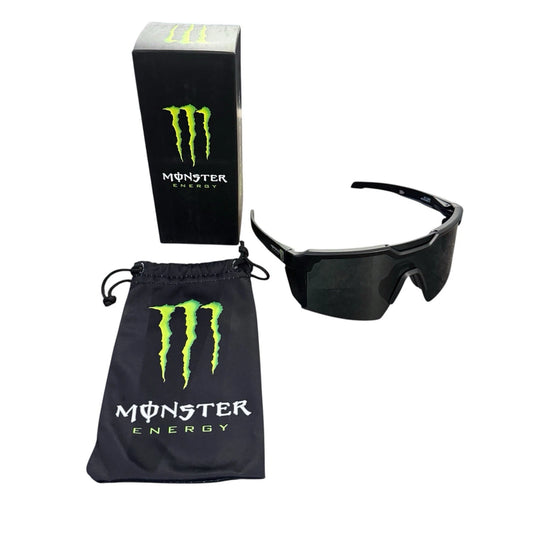 Black Monster Energy shield sunglasses shown with their black branded box and matching black drawstring pouch on a plain white background.