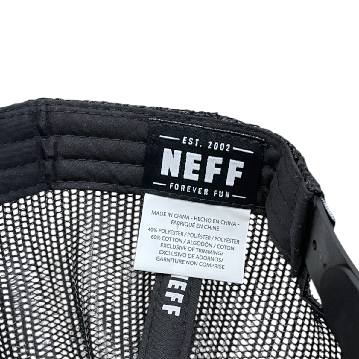 Neff cap with brand label and mesh back on a white background