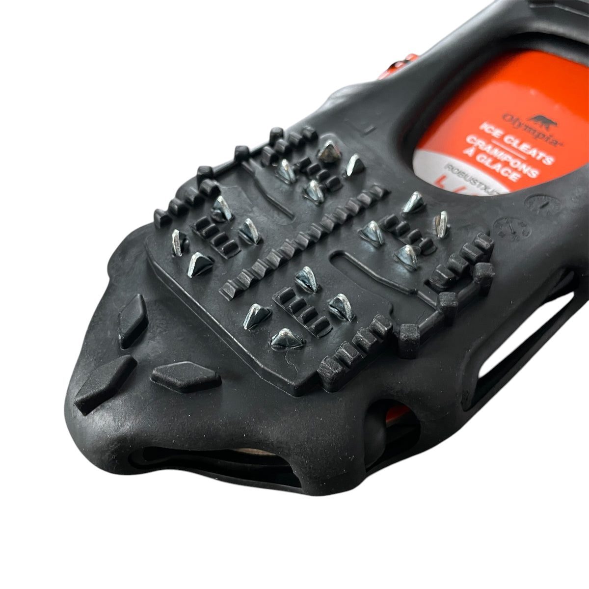 Close up view of a pair of black Olympia ice cleats with a brand label on a white background