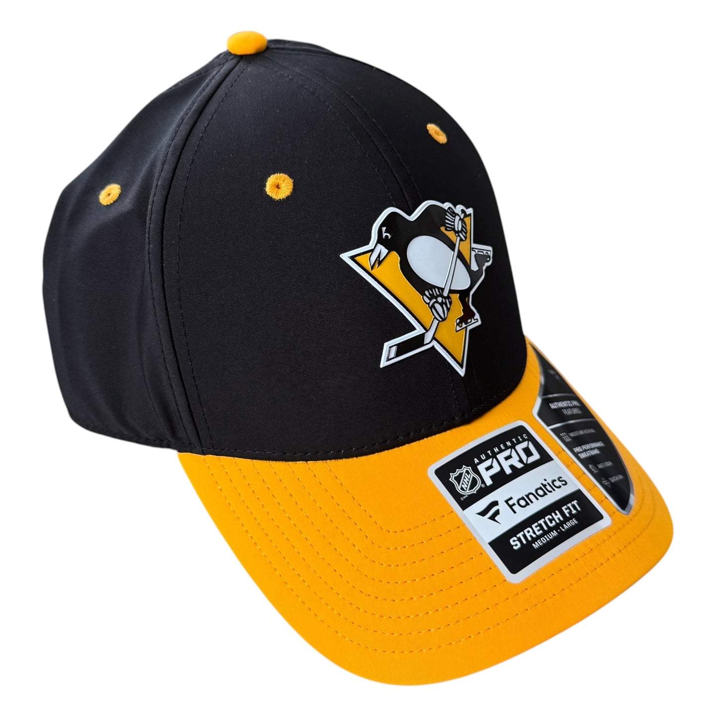 A Pittsburgh Penguins NHL Pro Stretch Fit baseball cap with a black crown, yellow brim, and the team logo on the front, shown on a white background.