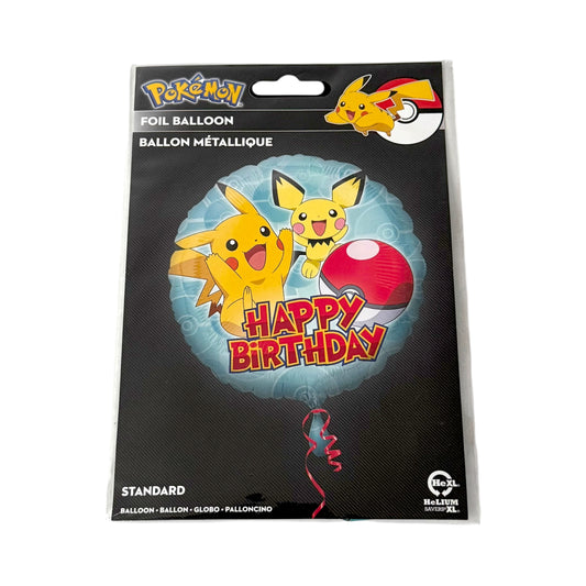A packaged foil balloon on a black backing card featuring Pikachu and a red Poké Ball with the words 'Happy Birthday.' The package includes the Pokémon logo and a Poké Ball graphic at the top, and the balloon itself is partially visible as a red spiral at the bottom.