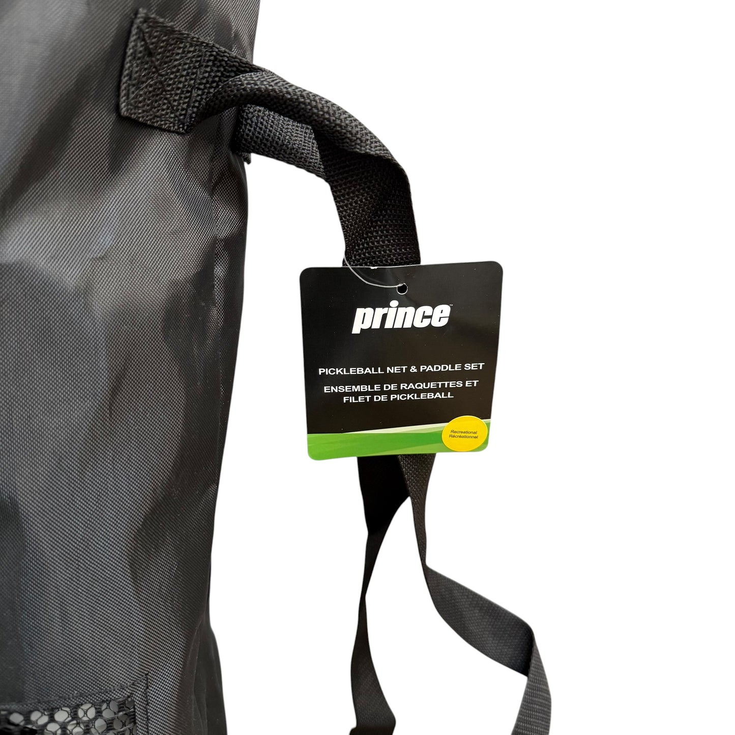 Tag for a Prince Pickleball Net & Paddle Set including portable net, paddles, pickleballs, and carrying bag for recreational outdoor play. Shown on a white background.
