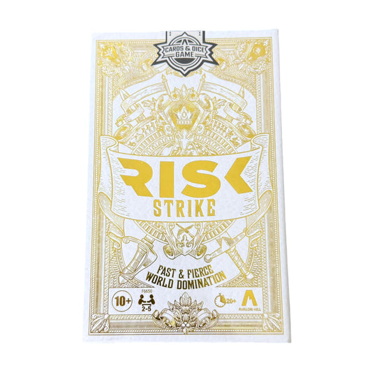 Risk Strike game box with gold and white design on a white background