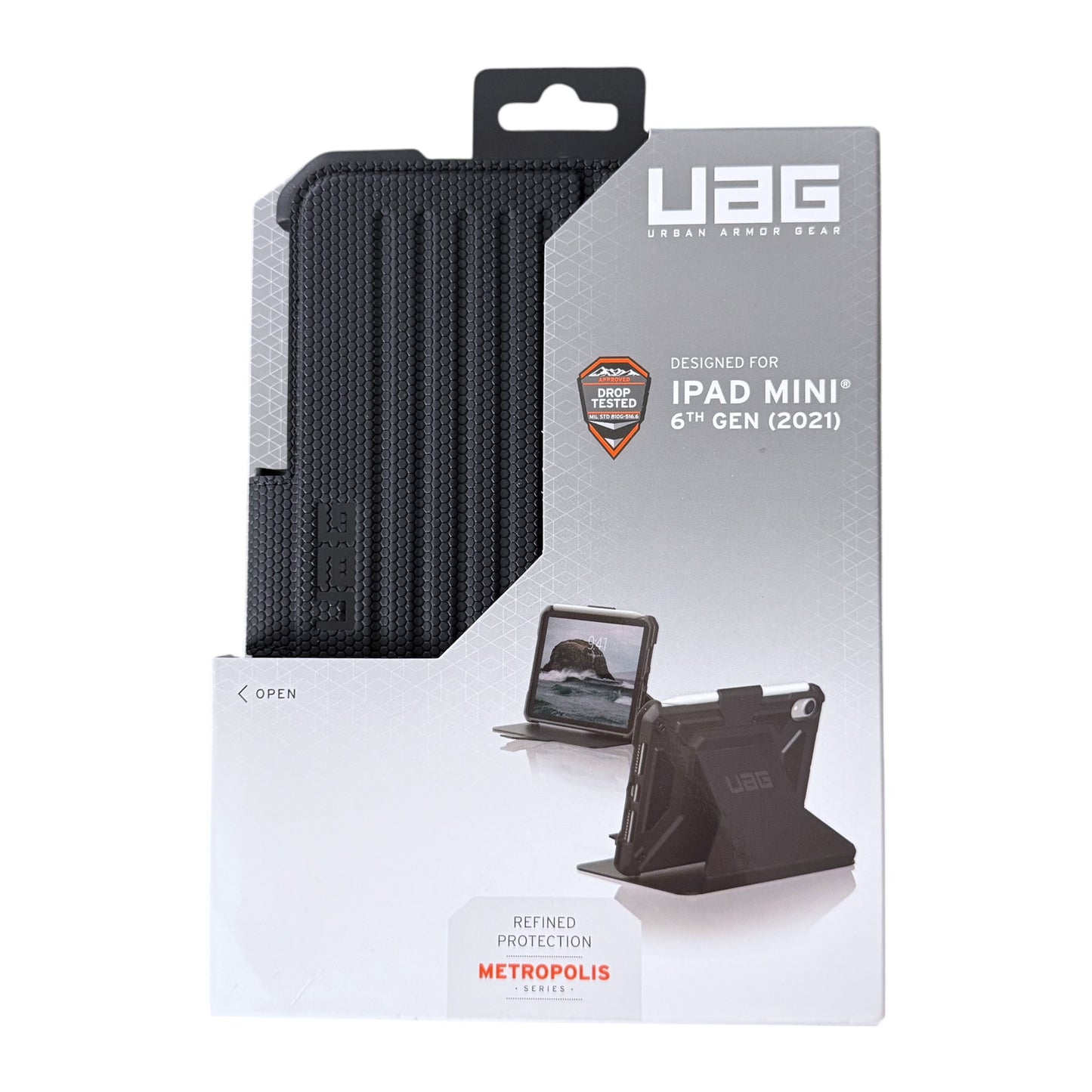 UAG Urban Armor Gear black protective case for iPad Mini 6th Gen (2021) in its original retail packaging, featuring a textured black cover and a white box with product details and a Metropolis Protection badge.