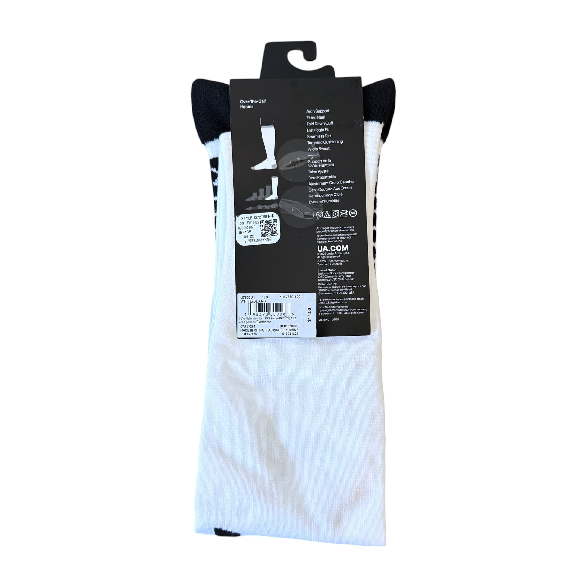 A pair of white UA crew socks with black trim and a black hanging retail card, shown against a plain white background.