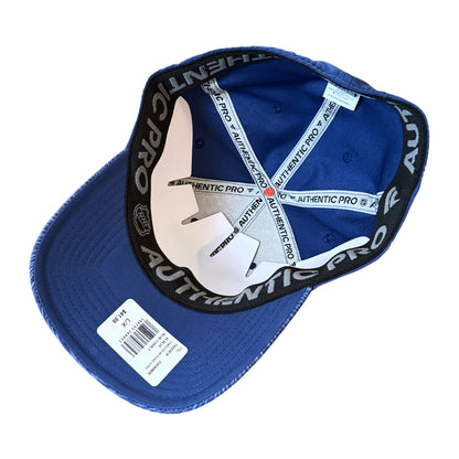 A blue Authentic Pro baseball cap shown from the inside, featuring a black inner band with white 'AUTHENTIC PRO' lettering, white adjustable straps, and a white hangtag.