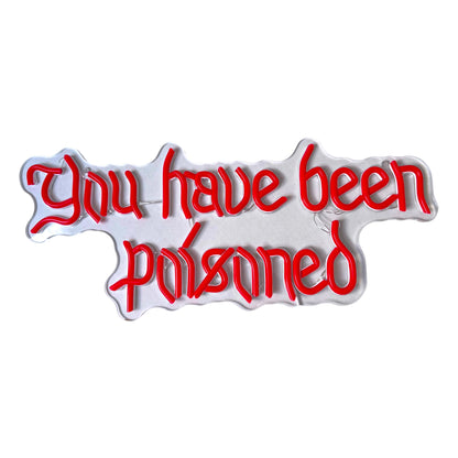 Red text LED sign with the words 'You have been poisoned' on a white background