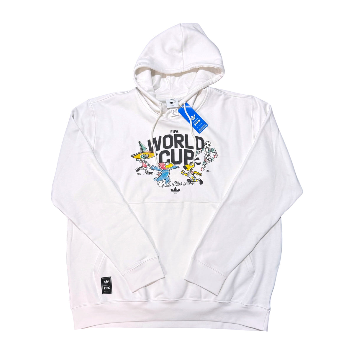 A white pullover hoodie featuring a colorful graphic print on the chest with cartoon characters and the text 'FIFA WORLD CUP'. It has a blue hangtag and a small black brand patch on the lower left sleeve, photographed flat against a solid white background.