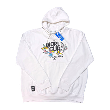 A white pullover hoodie featuring a colorful graphic print on the chest with cartoon characters and the text 'FIFA WORLD CUP'. It has a blue hangtag and a small black brand patch on the lower left sleeve, photographed flat against a solid white background.