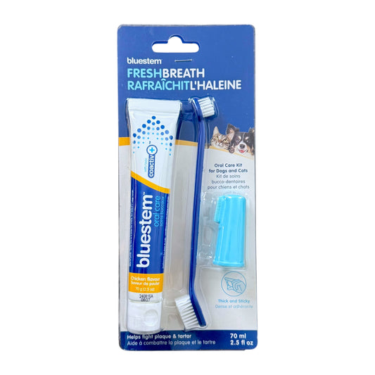 Bluestem Fresh Breath Oral Care Kit for dogs and cats, featuring a blue and white toothpaste tube, a blue and white toothbrush, and a light blue replacement brush head, all in retail blister packaging.