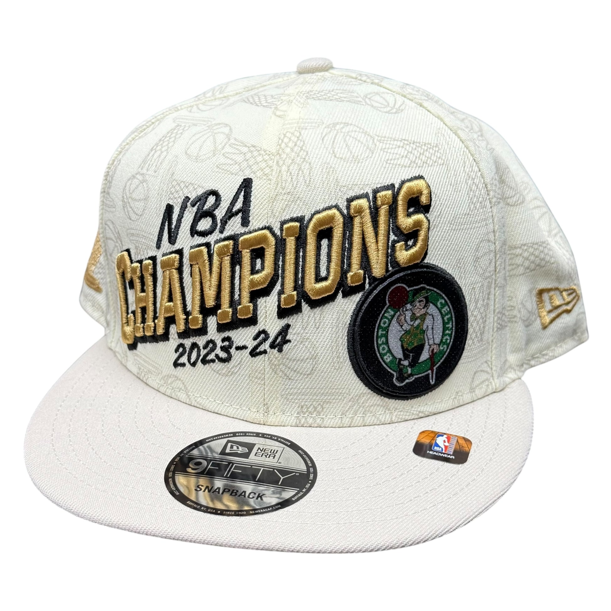 White cap with 'NBA Champions 2023-24' text and Boston Celtics logo on a white background