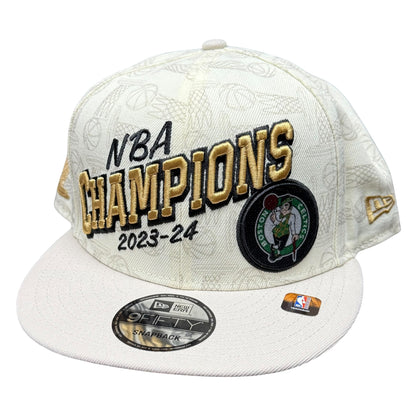 White cap with 'NBA Champions 2023-24' text and Boston Celtics logo on a white background