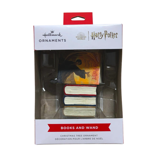 Hallmark Harry Potter Books and Wand Christmas tree ornament featuring stacked books and a wand in its window display box.