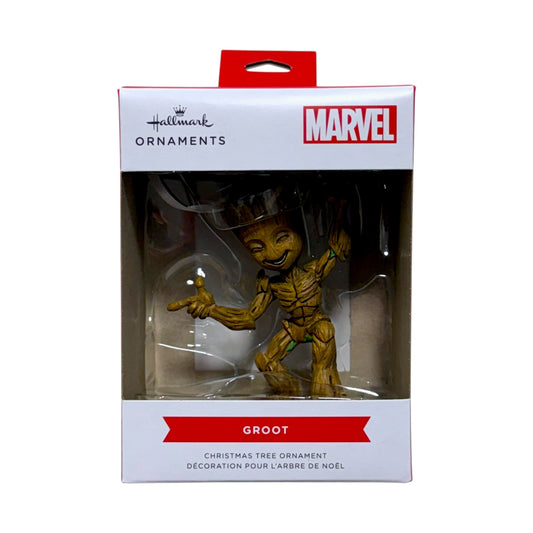 Hallmark Marvel Groot Christmas tree ornament with a smiling face and raised arms in its window display box