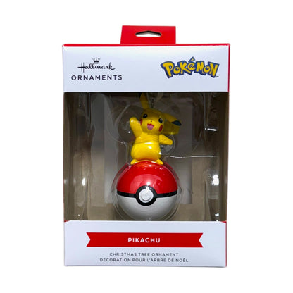Hallmark Pokémon Pikachu Christmas tree ornament with Pikachu waving from a red and white Poké Ball in its display box
