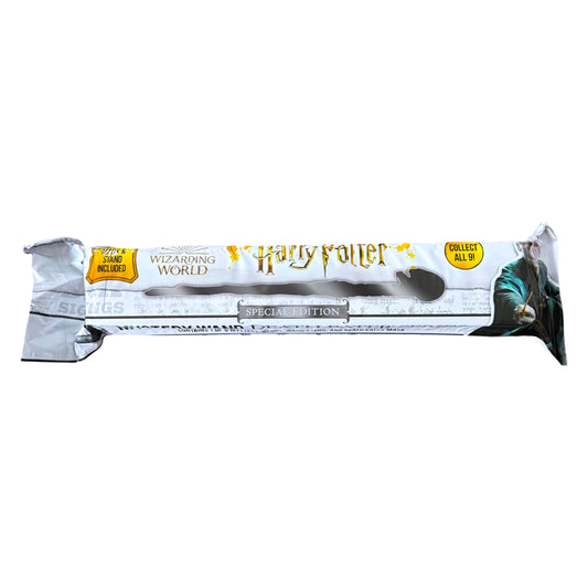 A Harry Potter Wizarding World collectible wand in its original silver foil packaging, featuring the yellow 'Harry Potter' logo and character artwork of Voldermort on the right side.