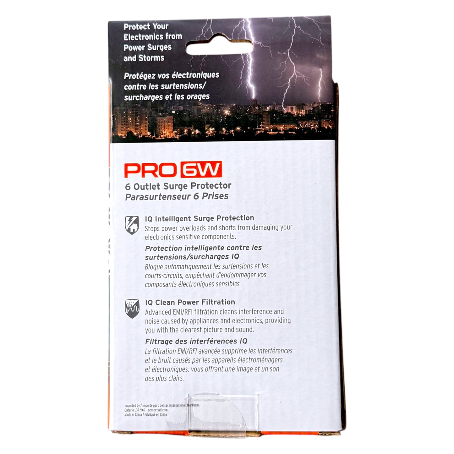 6 Outlet Surge Protector retail packaging, featuring a white lower section with product details and a dark storm-lit cityscape at the top.