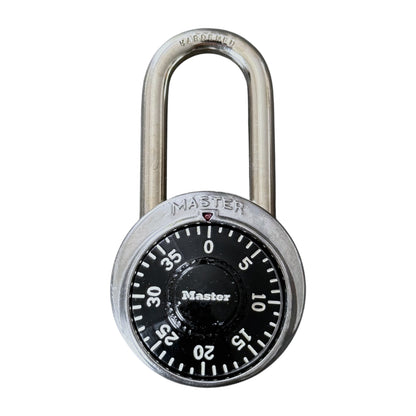 A Master brand combination lock with a silver metal shackle and body, featuring a black dial face with white numbers and markings.