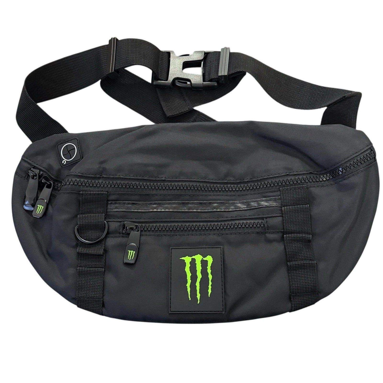 A black Monster Energy crossbody fanny pack with a bright green claw logo patch on the front, shown against a plain white background.