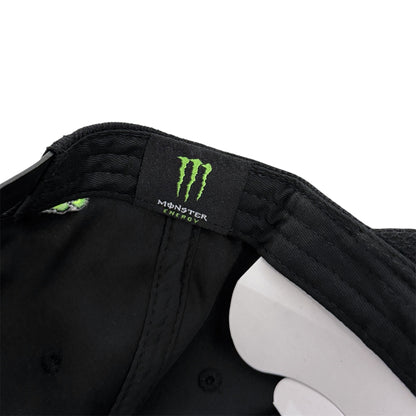 Close-up of a a Monster Energy logo inside a hat on a white background