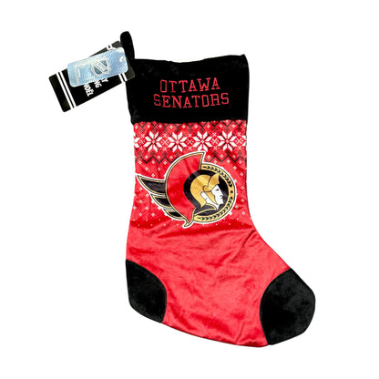 Red and black Christmas stocking with Ottawa Senators logo on a white background