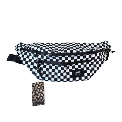 A Vans checkered fanny pack with a black and white checkerboard pattern, featuring a front zip pocket and a small black Vans logo patch. A matching small pouch with a black and white Vans text pattern is shown below the main bag on a plain white background.